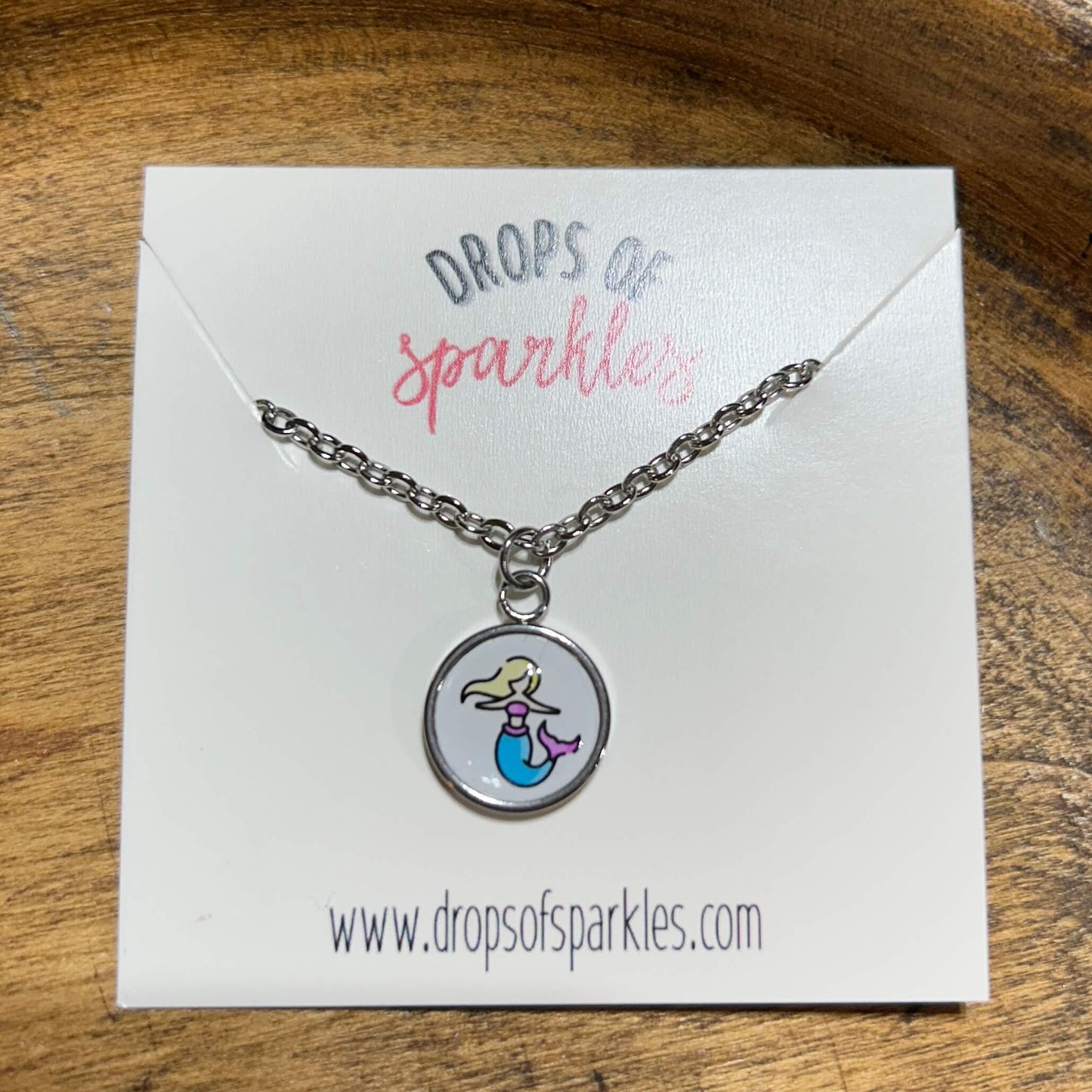 Mermaid stud earrings & pendant necklace
