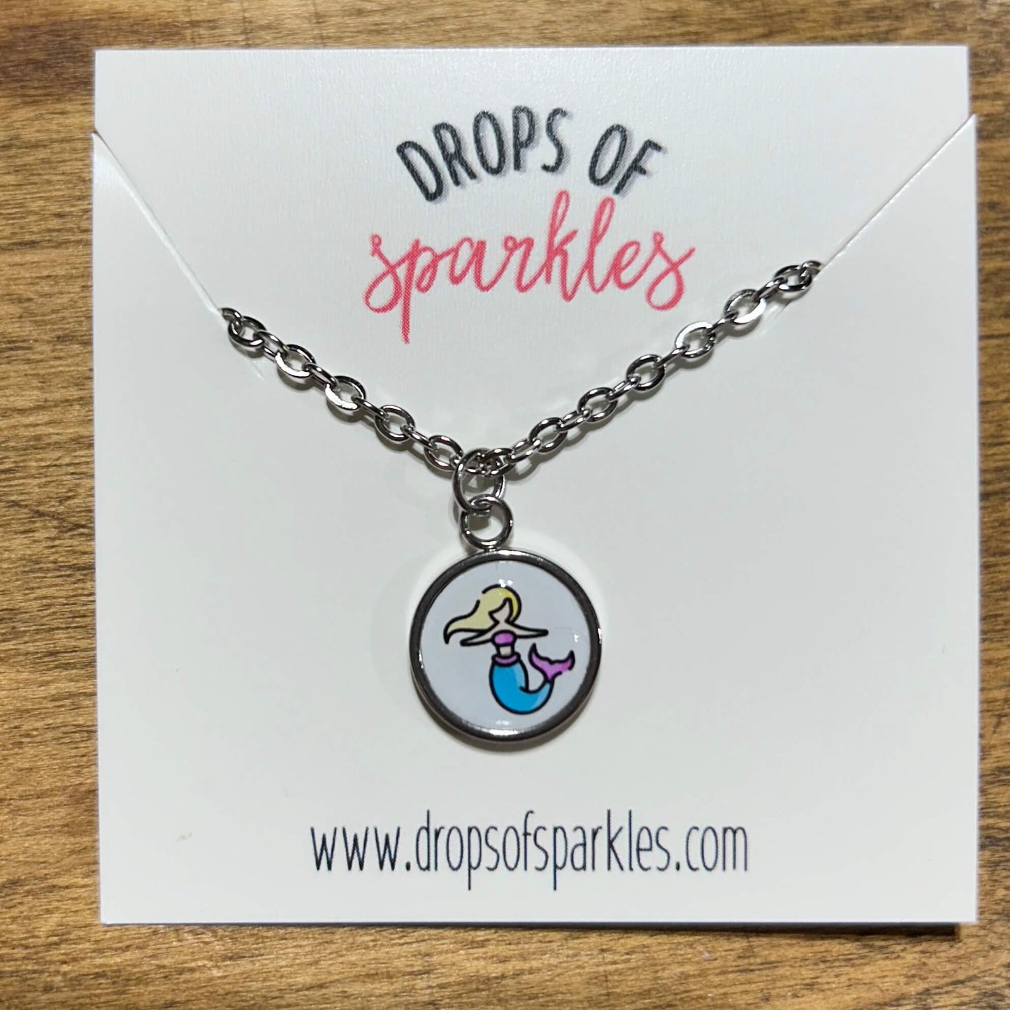 Mermaid stud earrings & pendant necklace