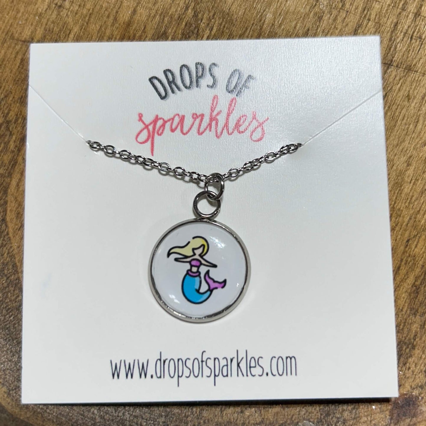 Mermaid stud earrings & pendant necklace