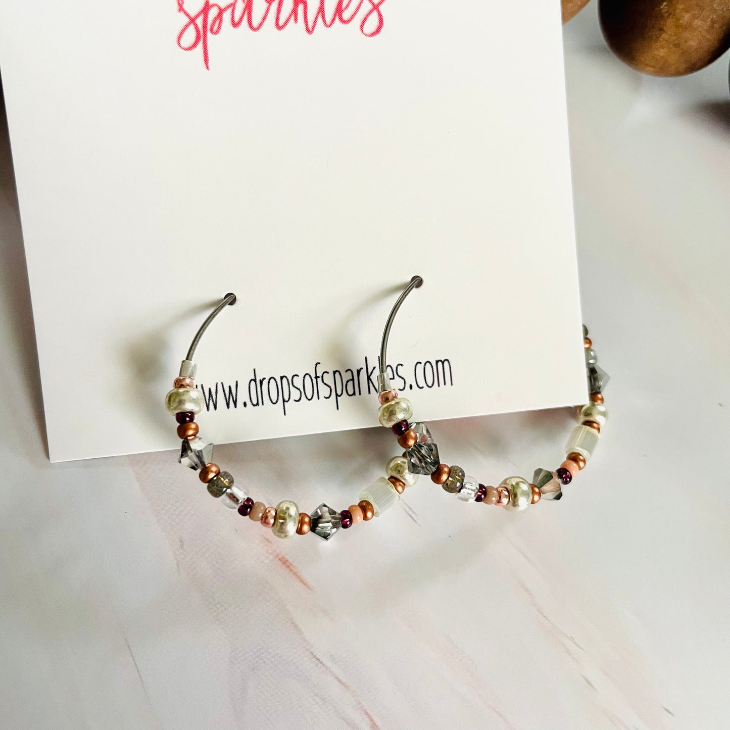 Beaded medium size stainless steel silver hoop earrings