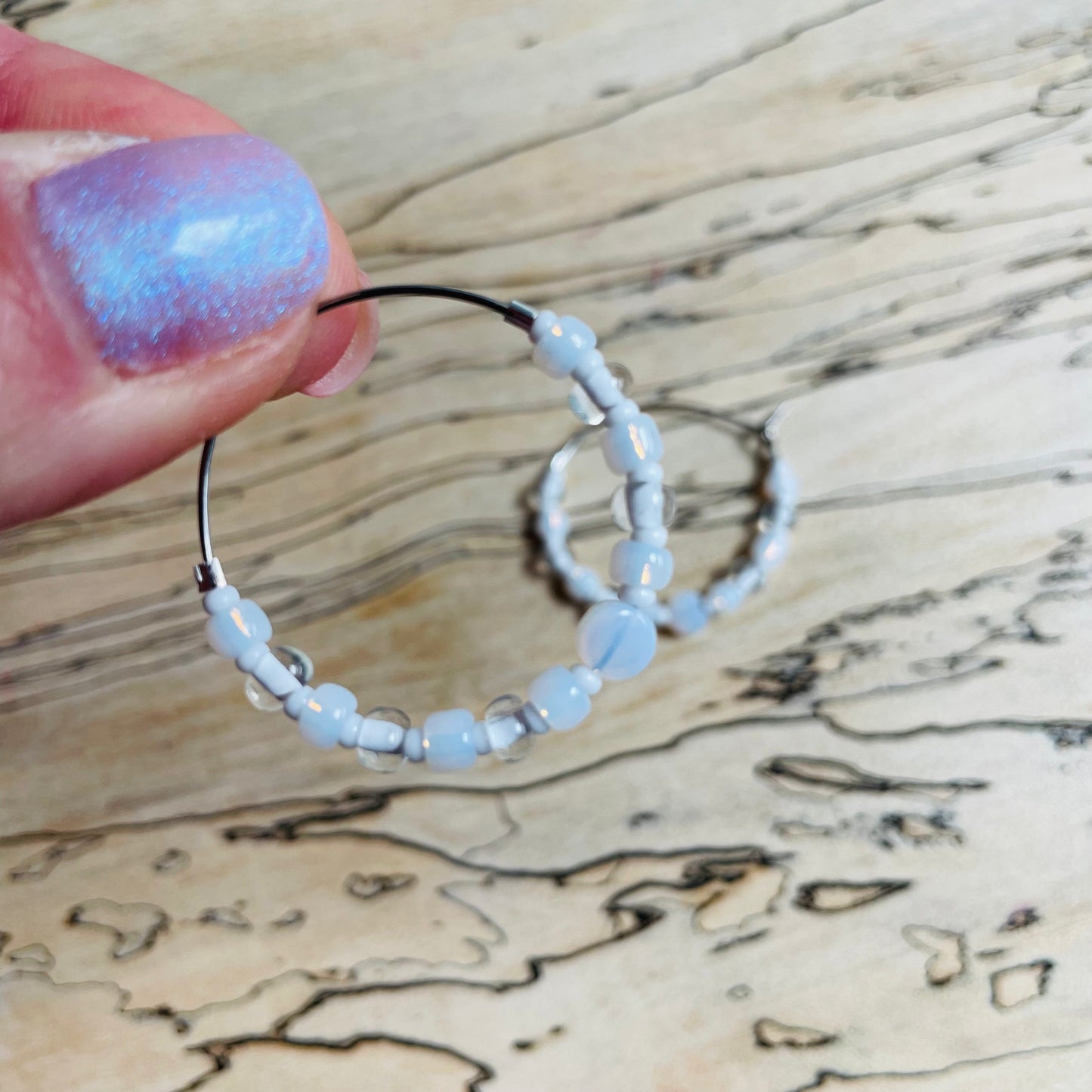 Beaded medium size stainless steel silver hoop earrings