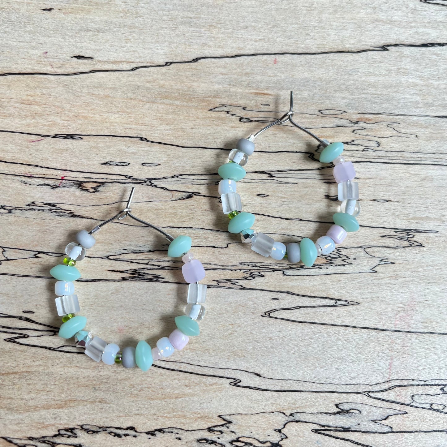 Beaded medium size stainless steel silver hoop earrings