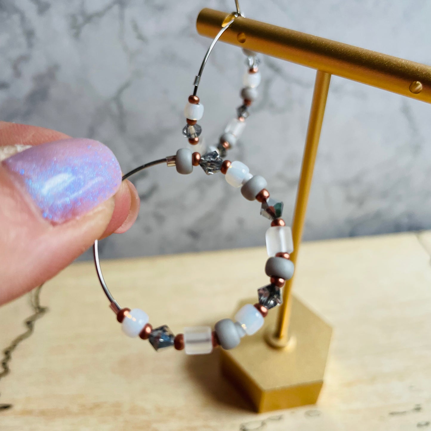 Beaded medium size stainless steel silver hoop earrings