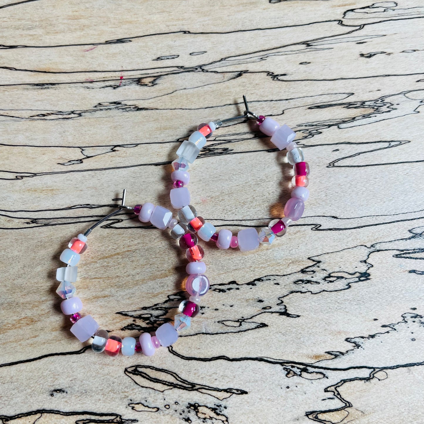 Beaded medium size stainless steel silver hoop earrings