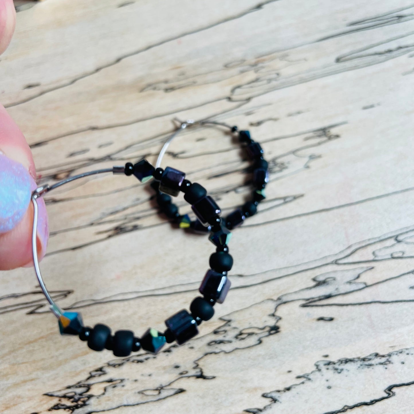 Beaded medium size stainless steel silver hoop earrings