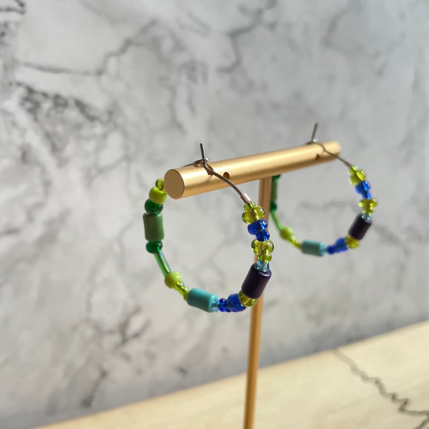 Beaded medium size stainless steel silver hoop earrings