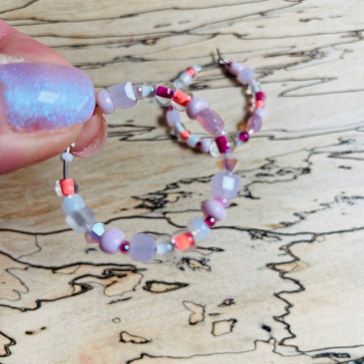 Beaded medium size stainless steel silver hoop earrings