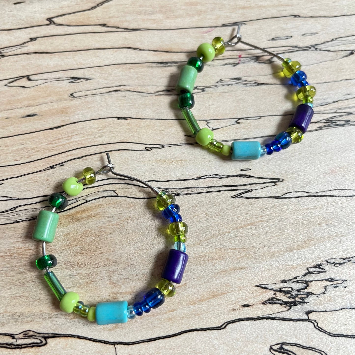 Beaded medium size stainless steel silver hoop earrings