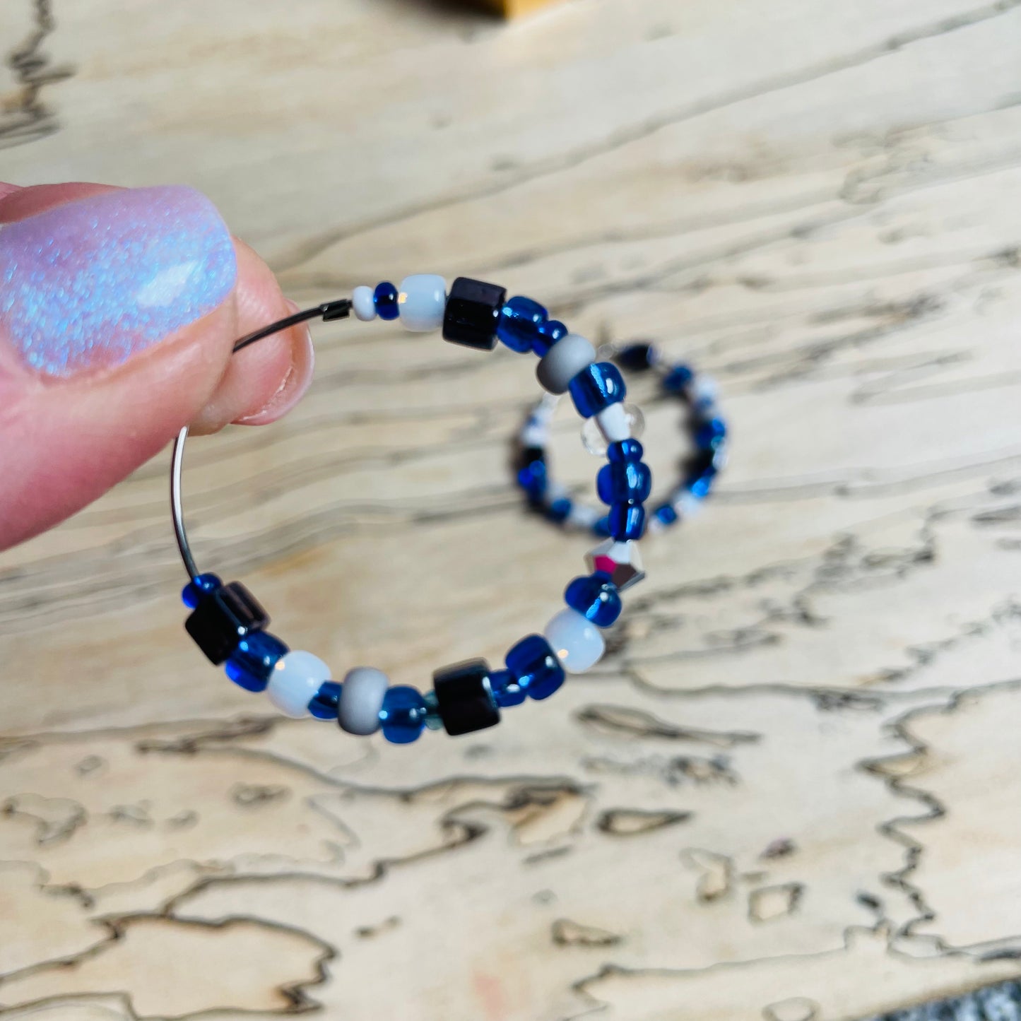 Beaded medium size stainless steel silver hoop earrings