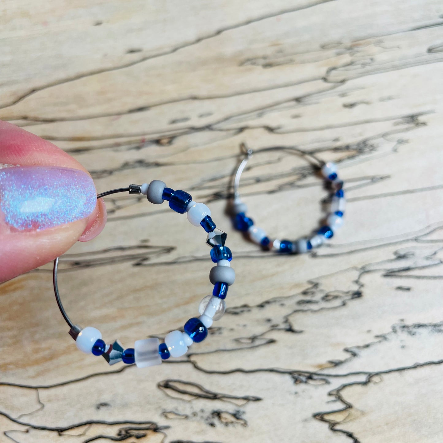 Beaded medium size stainless steel silver hoop earrings