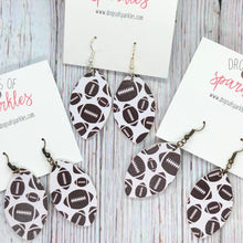 Load image into Gallery viewer, Football faux leather dangle earrings
