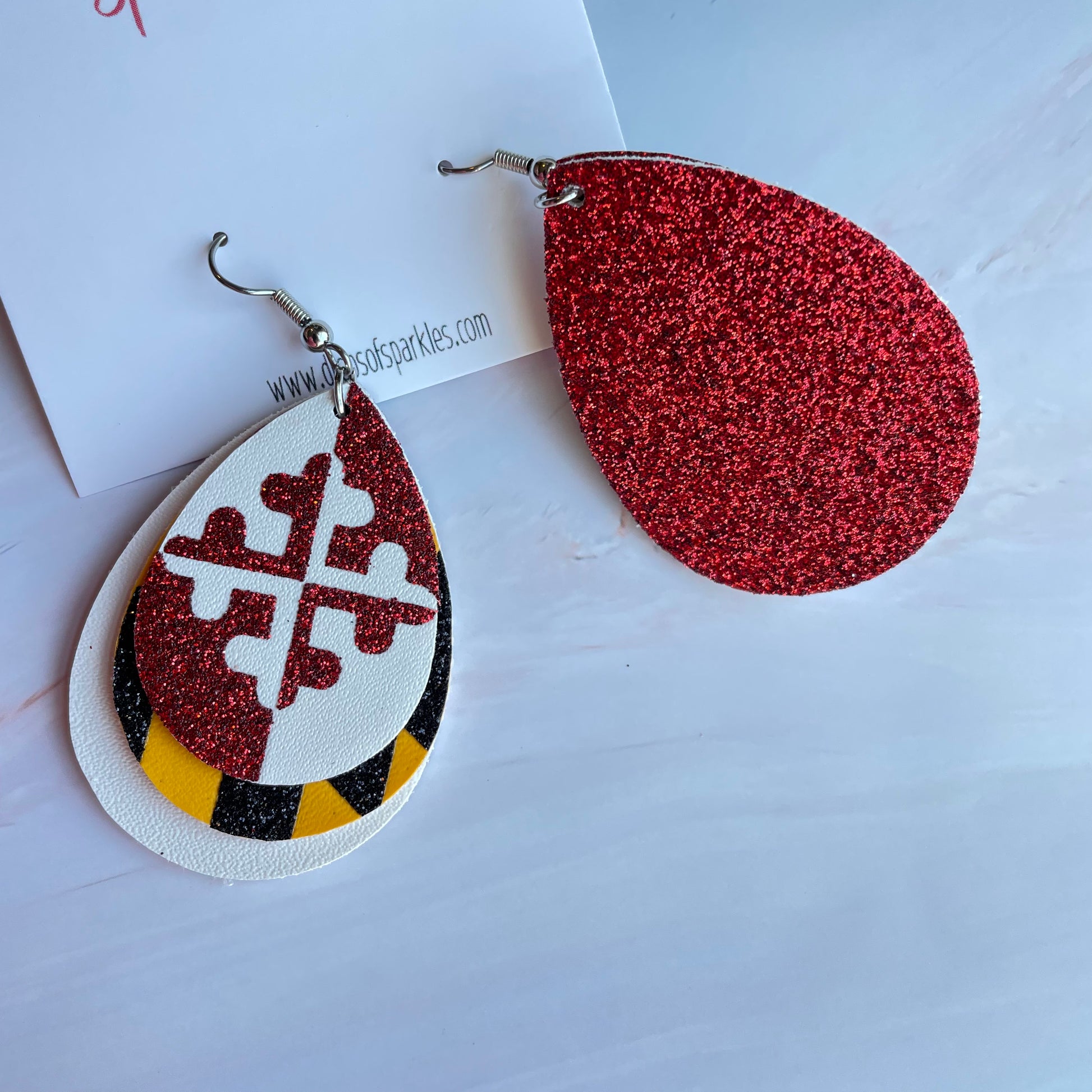 Triple layer, faux leather custom earrings with 3 color vinyl application