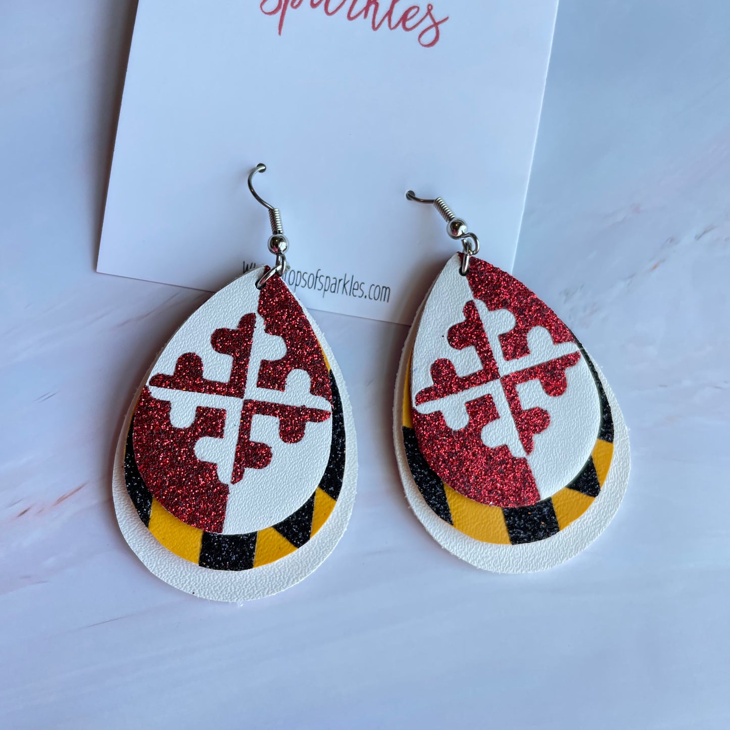 Triple layer, faux leather custom earrings with 3 color vinyl application